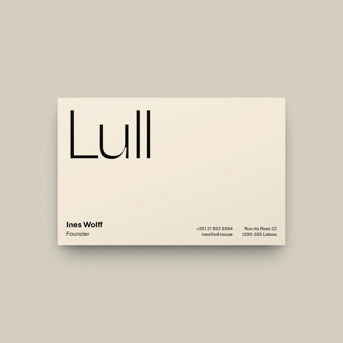 Auria wavy sans on a business card for a pool house: brand name in the light weight, name, title and contact lines