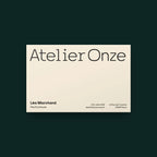 Nano bold slab serif on a business card for a perfume atelier: brand name in the light weight, name, title and contact lines